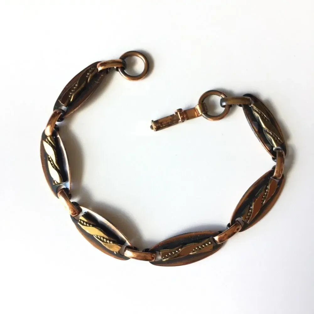 Copper tone abstract design link bracelet